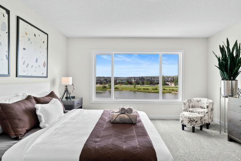 Wake up to peaceful water views from your beautiful master retreat