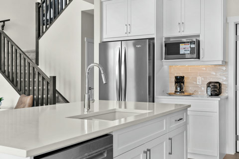 Bright modern kitchen where cooking and gathering come naturally together