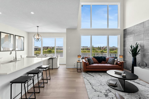 Sun-drenched living space with stunning waterfront views and modern style