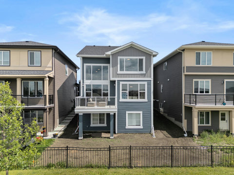 Enjoy your private elevated deck in this modern three-story retreat