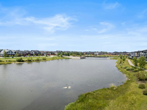 Wake up to stunning pond views right outside your door