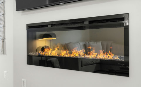 Curl up beside the stunning modern fireplace for cozy evenings in