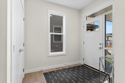 Welcome home to this bright, airy entryway full of natural light