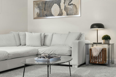 Sink into the plush sectional and unwind in style