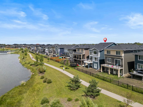 Wake up steps from a gorgeous lakeside walking trail and green space