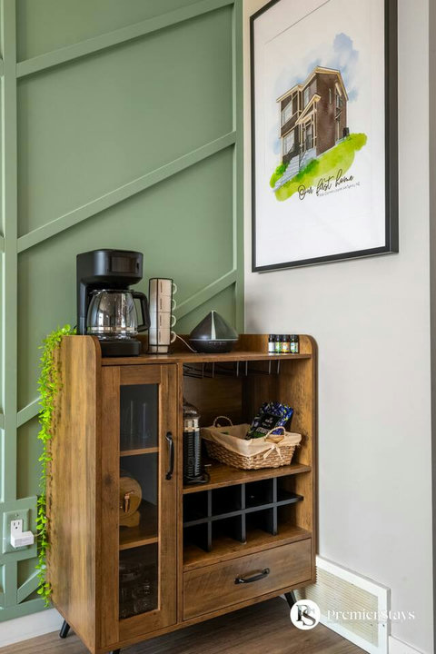 Charming coffee bar nook with mid-century modern wooden cabinet