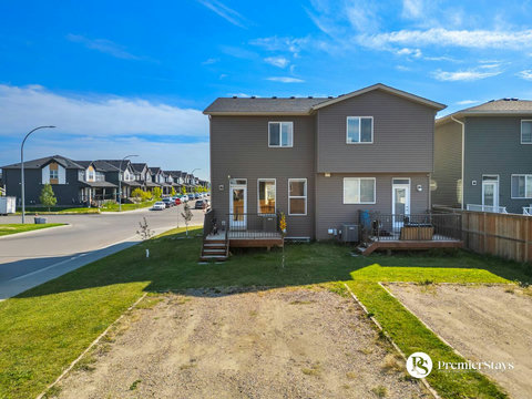 Enjoy your own private backyard oasis with deck and lush green space