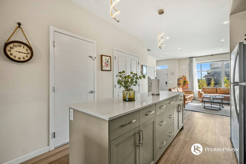 Bright modern kitchen with spacious island and seamless living area flow
