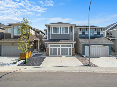 Welcome to your stylish modern home with beautiful curb appeal