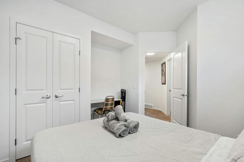 Comfortable guest bedroom with fresh linens and plenty of closet space
