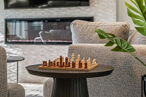 Cozy living room perfect for game nights by the fireplace