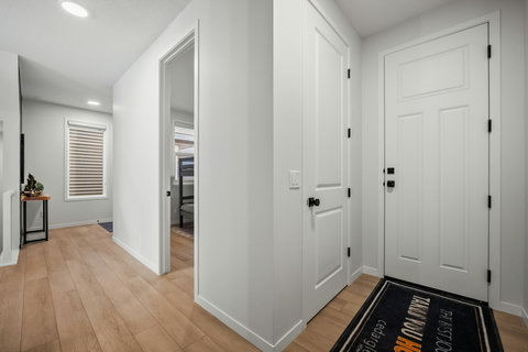 Welcoming foyer with clean modern design and natural lighting