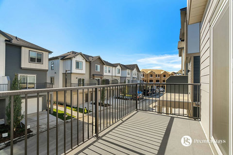 Expansive sun-filled deck perfect for morning coffee and community views