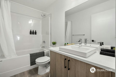 Spa-like master bathroom with dual vanity and luxurious walk-in shower