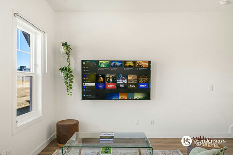 Comfortable living room with smart TV featuring all your favorite streaming services