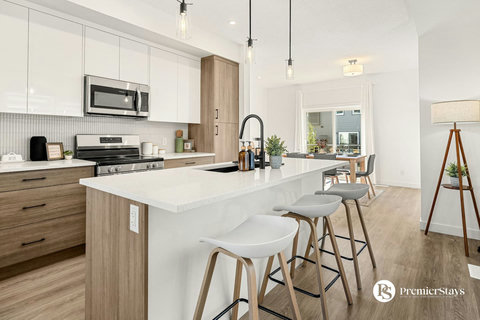 Bright modern kitchen with large island perfect for entertaining and cooking together