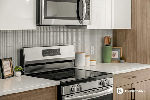 Stylish modern kitchen with stainless steel appliances and ample prep space