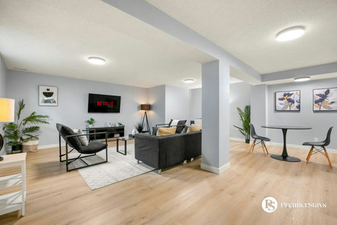 Versatile basement space perfect for relaxation and remote work