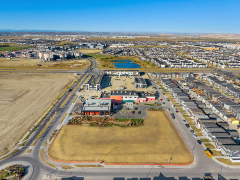 Stunning aerial perspective of the vibrant community and mountain views