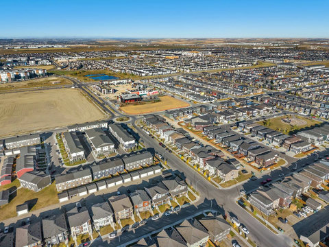 Stunning aerial perspective of vibrant new community with modern homes