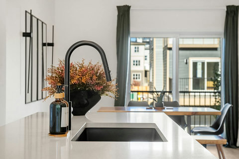 Sleek modern kitchen with waterfront views and contemporary design