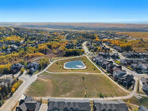 Beautiful community grounds with scenic pond and walking paths
