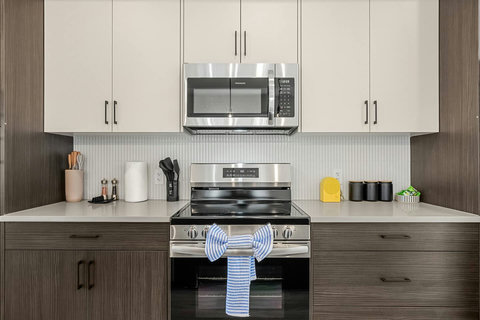 Fully equipped modern kitchen with stainless steel appliances and style
