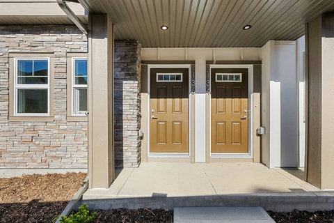 Welcome to your modern home with this bright, welcoming covered entrance