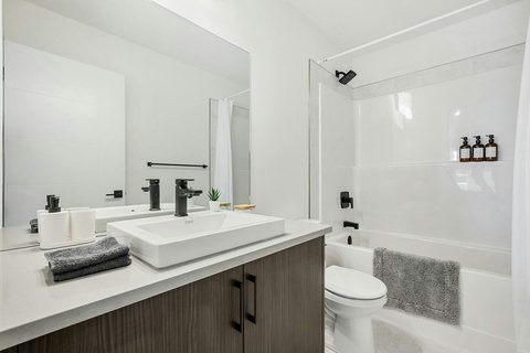 Spa-inspired bathroom with double vanity and spacious walk-in shower