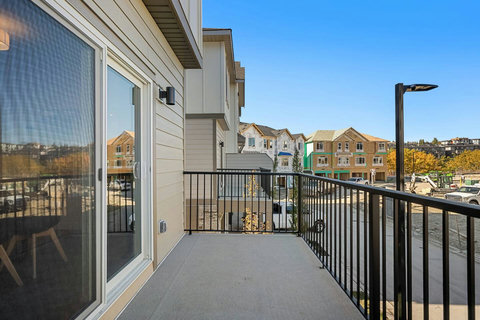 Enjoy morning coffee on your private balcony with courtyard views