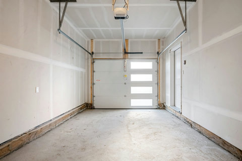 Spacious two-car garage with automatic door opener for convenient parking