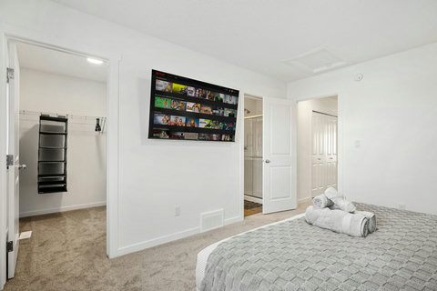 Comfortable guest bedroom with streaming entertainment and modern ensuite bathroom