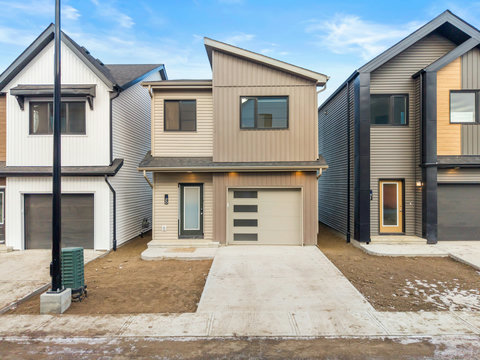 Welcome to your contemporary home with modern architectural design and private driveway