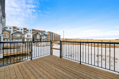 Wake up to serene water views from your private deck oasis