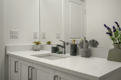 Spa-like bathroom featuring sleek double vanity and contemporary design