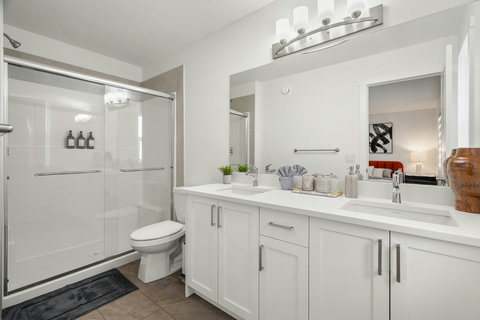 Luxurious master bath with plenty of counter space and modern fixtures