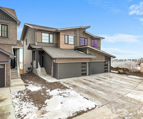 Welcome to this stylish contemporary home with ample parking and modern amenities