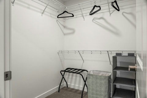 Spacious walk-in closet with ample storage and organization systems
