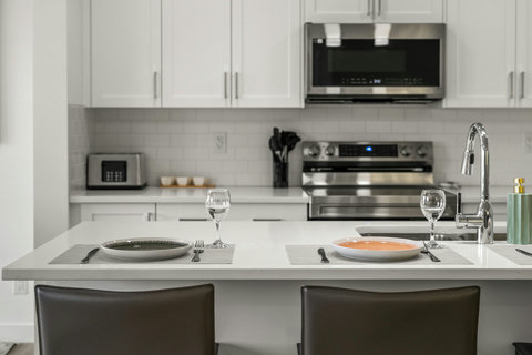 Sleek modern kitchen perfect for preparing meals together with friends
