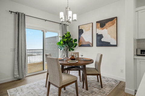 Elegant dining space with scenic views and contemporary furnishings