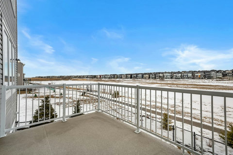 Soak in sweeping open field views from the private upper deck