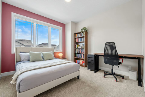 Rest and recharge in this cosy bedroom with a bright window outlook