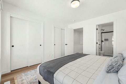Bright master suite with walk-in closets and luxurious ensuite bathroom