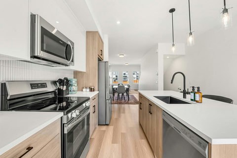 Sleek modern kitchen perfect for preparing meals together with friends