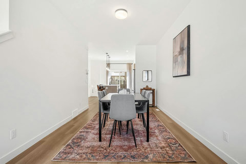 Elegant dining space flowing seamlessly into the open kitchen