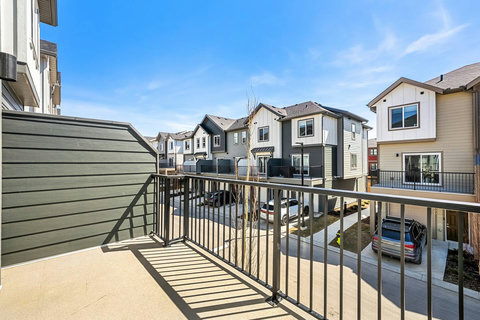 Spacious elevated deck with views of the surrounding neighborhood community