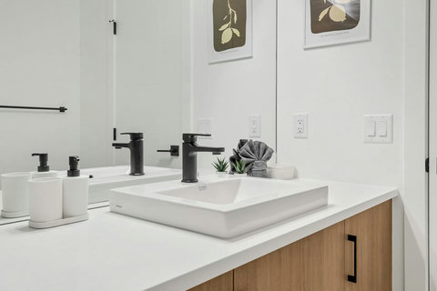 Spa-like master bath with dual sinks and elegant finishes