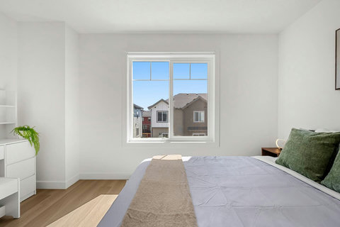 Serene guest bedroom filled with natural light and fresh air