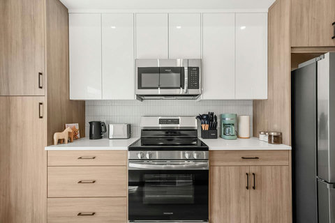 Sleek modern kitchen perfectly equipped for preparing home-cooked meals