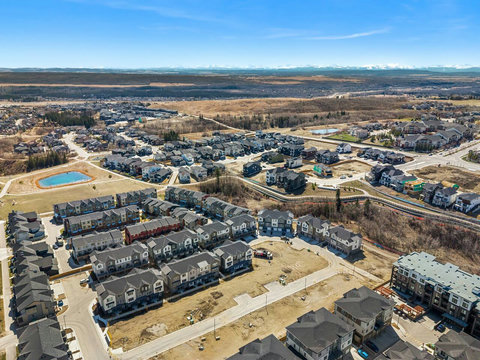 Stunning aerial perspective showcasing the vibrant community and mountain vistas